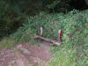 Photograph of the dilapidated, vandalised bench at The Alcove