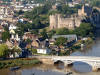 View of Chepstow Castle and bridge, The Bridge Inn is bottom left.